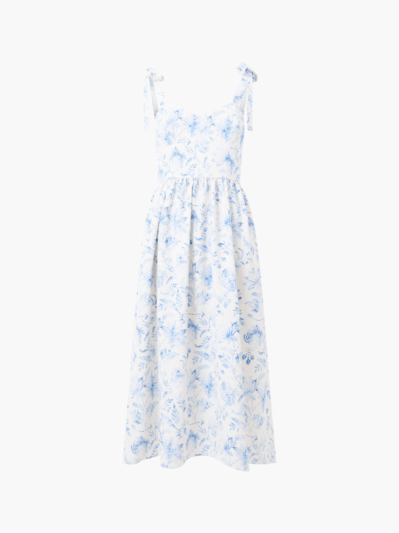 The Serenity Dale Crepe Midi Dress by French Connection is a sleeveless white midi dress with blue botanical print, a fitted bodice, gathered waist, and shoulder tie straps—perfect for sunny days.