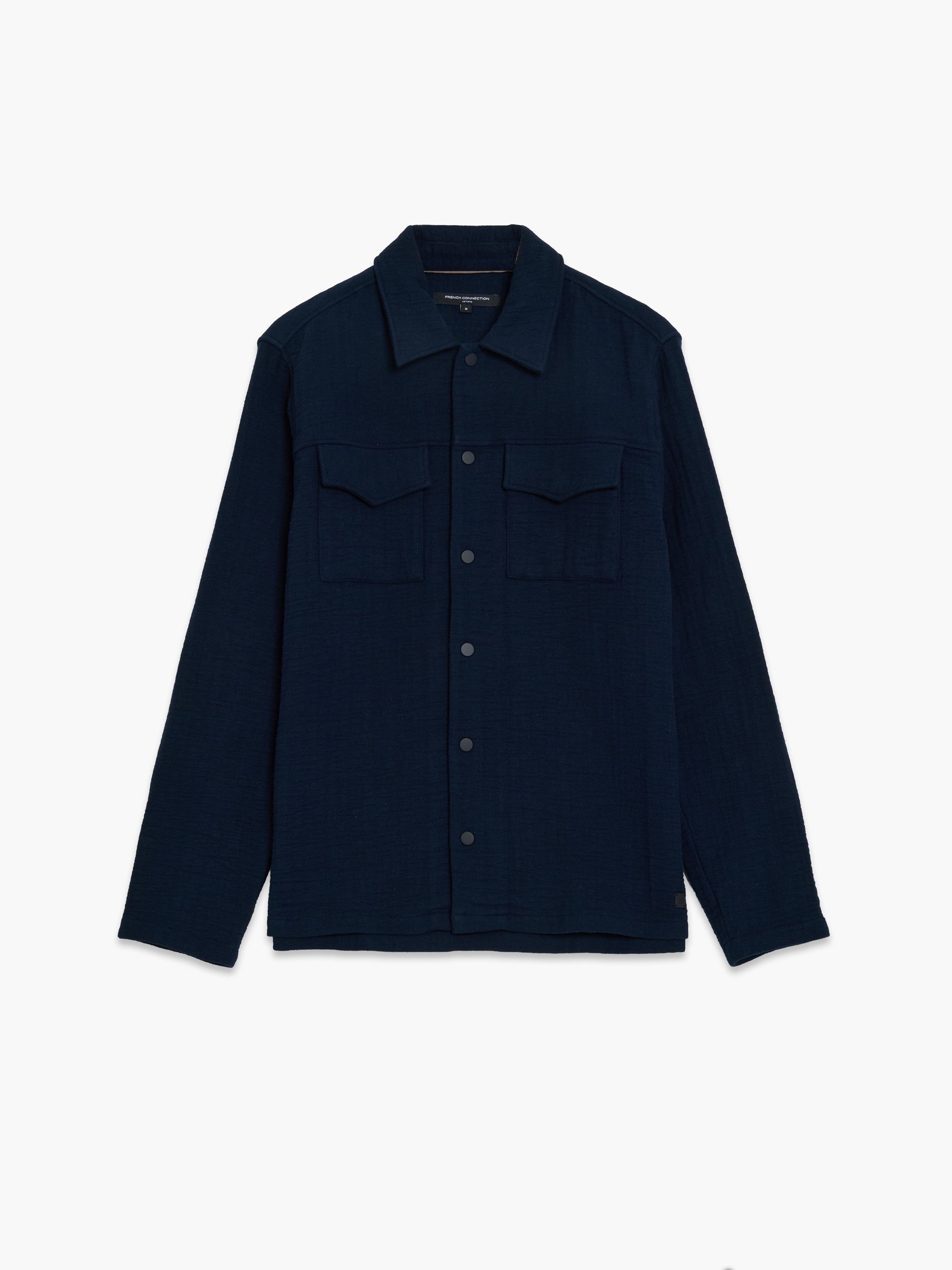 A navy blue long sleeve shirt with 2 front pockets