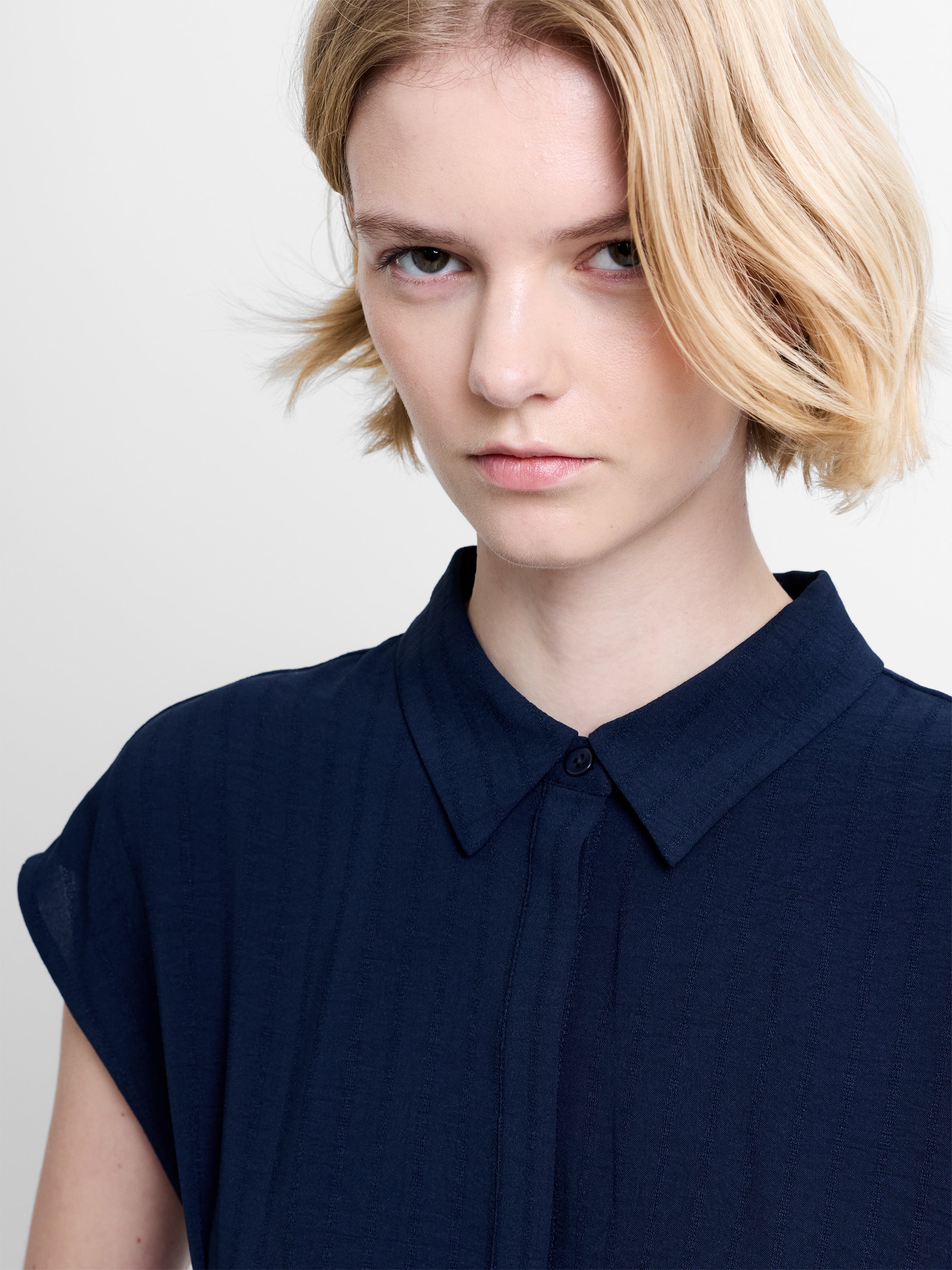 Codie Pleated Button Down Peplum Top