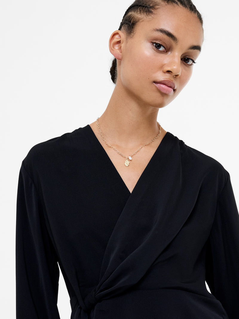 Laurel Crepe Wrap Peplum Top