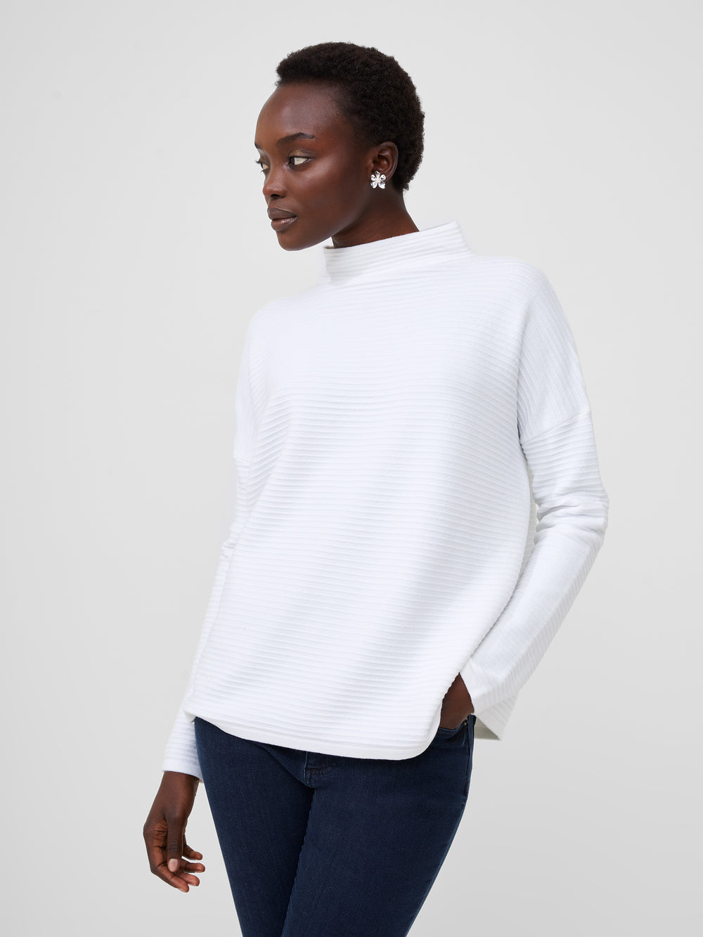 White jumper high clearance neck